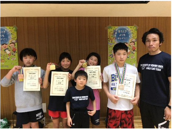 選手と、代表の木村